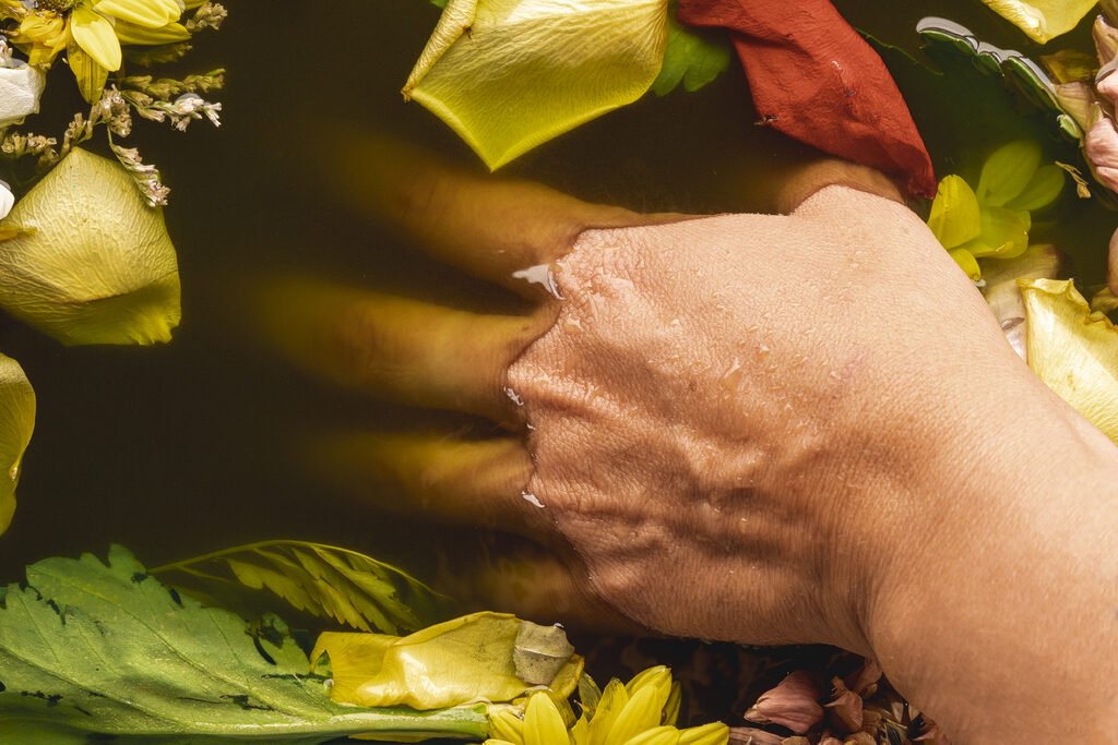 Best spring detox program Abu Dhabi 2 hand black water close up